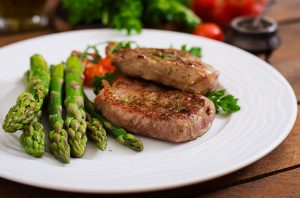 barbecue-grilled-beef-steak-meat-with-asparagus-tomatoes_web