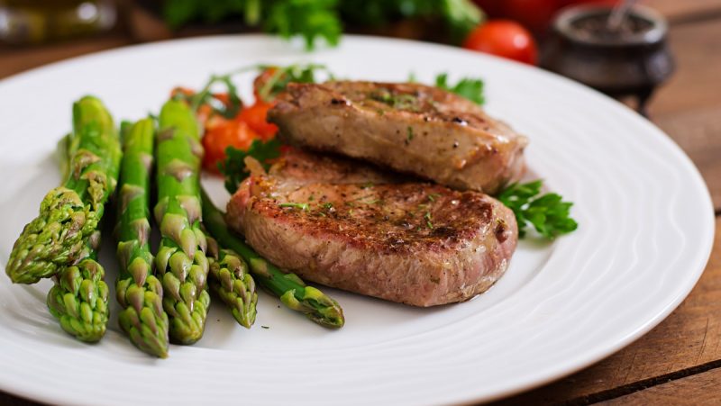 barbecue-grilled-beef-steak-meat-with-asparagus-tomatoes_web